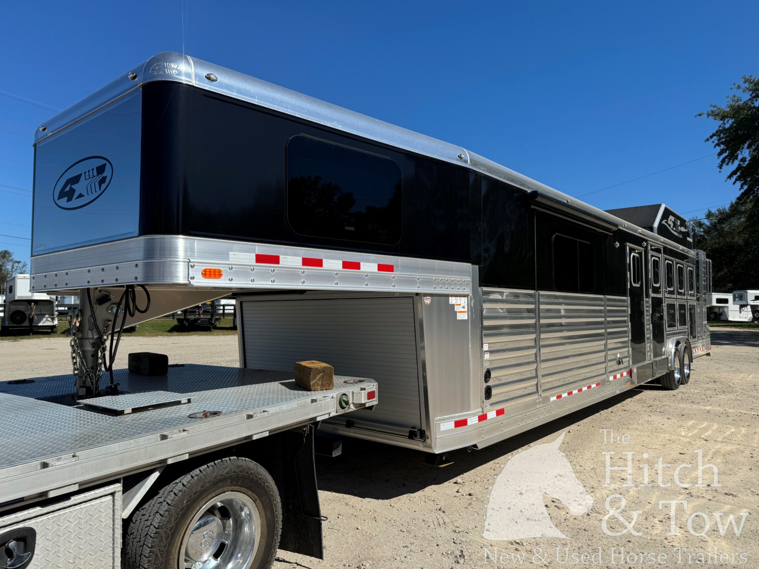 2023 4 STAR DELUXE 4 HORSE W/ 15′ OUTBACK LIVING QUARTERS, TONS OF UPGRADES, & TONS OF STORAGE!! $234,000