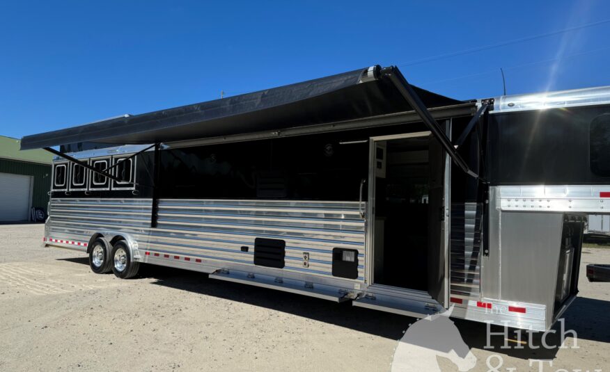 2023 4 STAR DELUXE 4 HORSE W/ 15′ OUTBACK LIVING QUARTERS, TONS OF UPGRADES, & TONS OF STORAGE!! $234,000