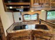 2024 ELITE 4 HORSE W/ 12’8″ OUTBACK LIVING QUARTERS, TONS OF UPGRADES, & TONS OF STORAGE!! $131,900