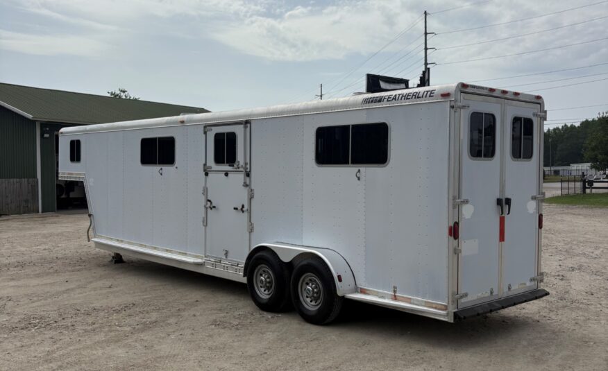 2002 FEATHERLITE 4 HORSE HEAD TO HEAD $22,500