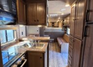 2023 LAKOTA CHARGER EDITION 4 HORSE GOOSENECK WITH 16′ LQ & SLIDE OUT! $69,900