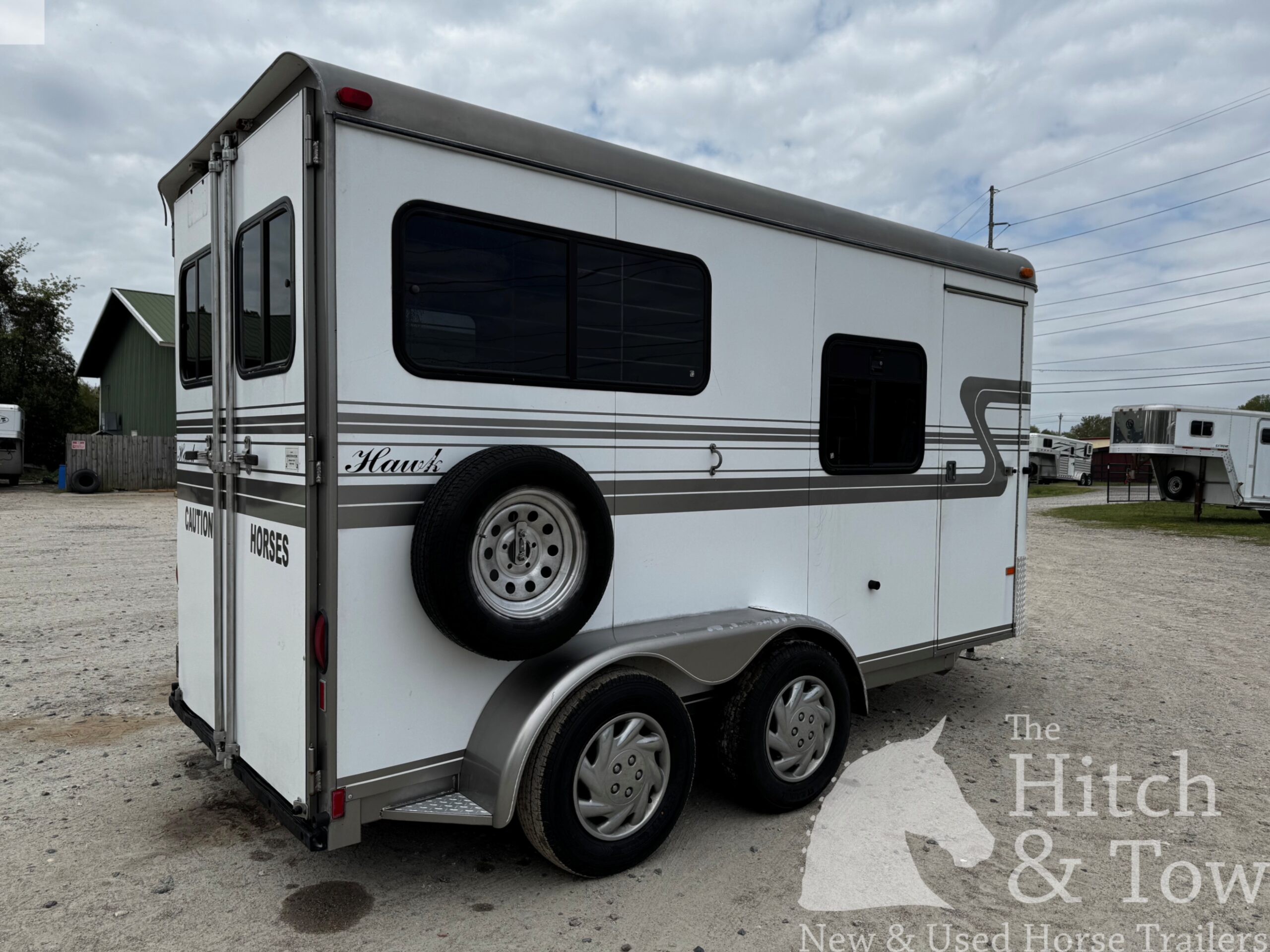 1999 HAWK 2 HORSE BUMPER PULL W/ MANGERS $7,900