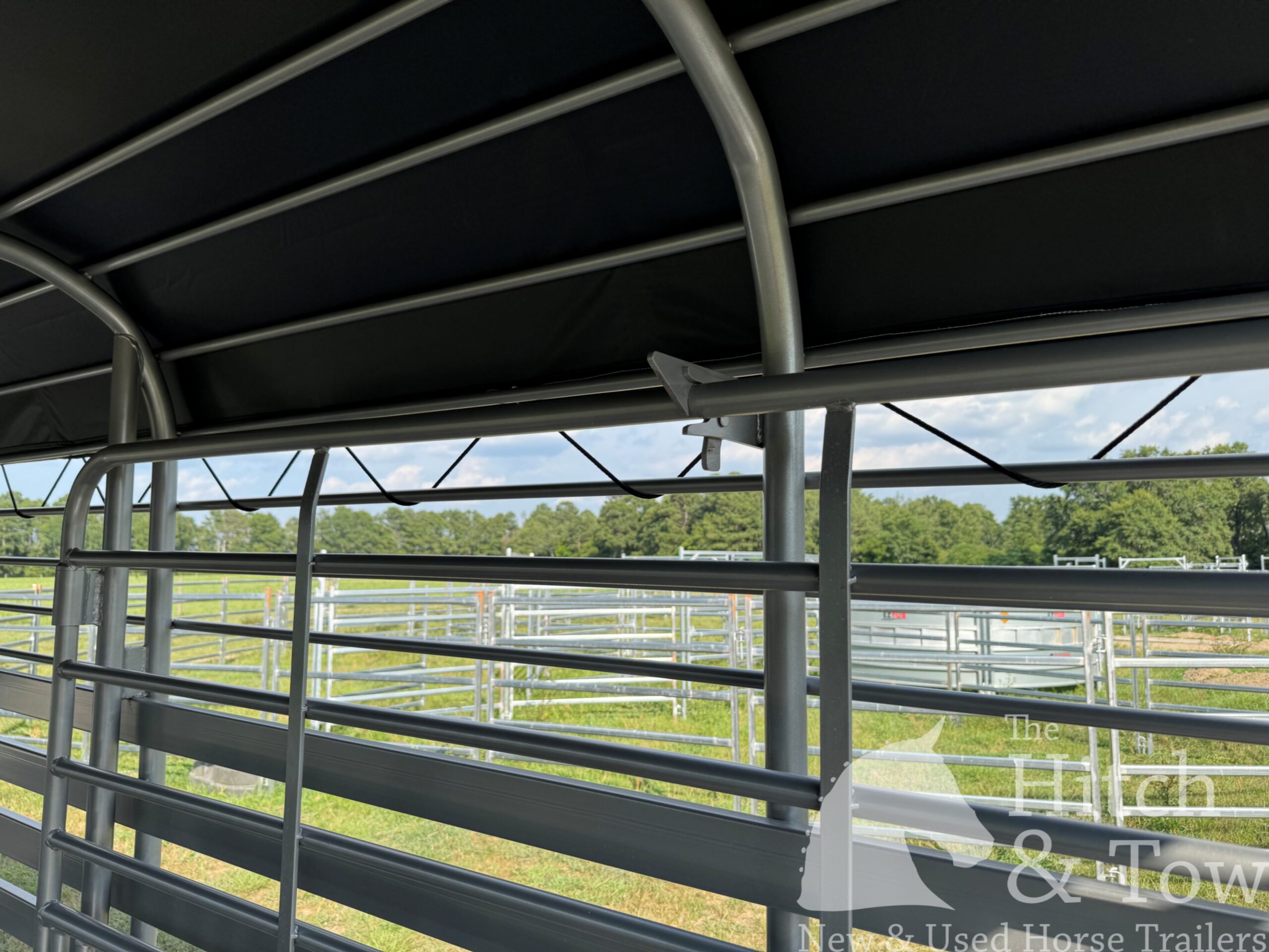 2026 20′ LIVESTOCK STOLL TRAILER W/ TUBE SIDES AND BLACK CANVAS TOP $17,580