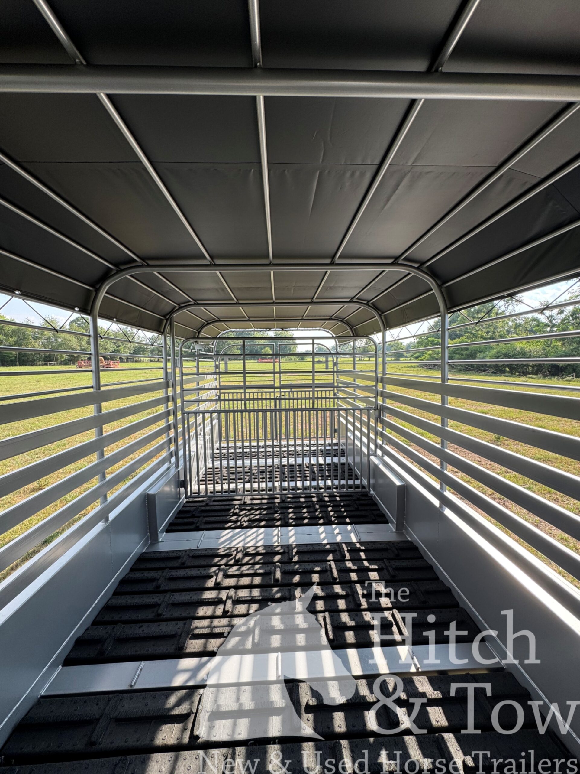 2026 20′ LIVESTOCK STOLL TRAILER W/ TUBE SIDES AND BLACK CANVAS TOP $17,580