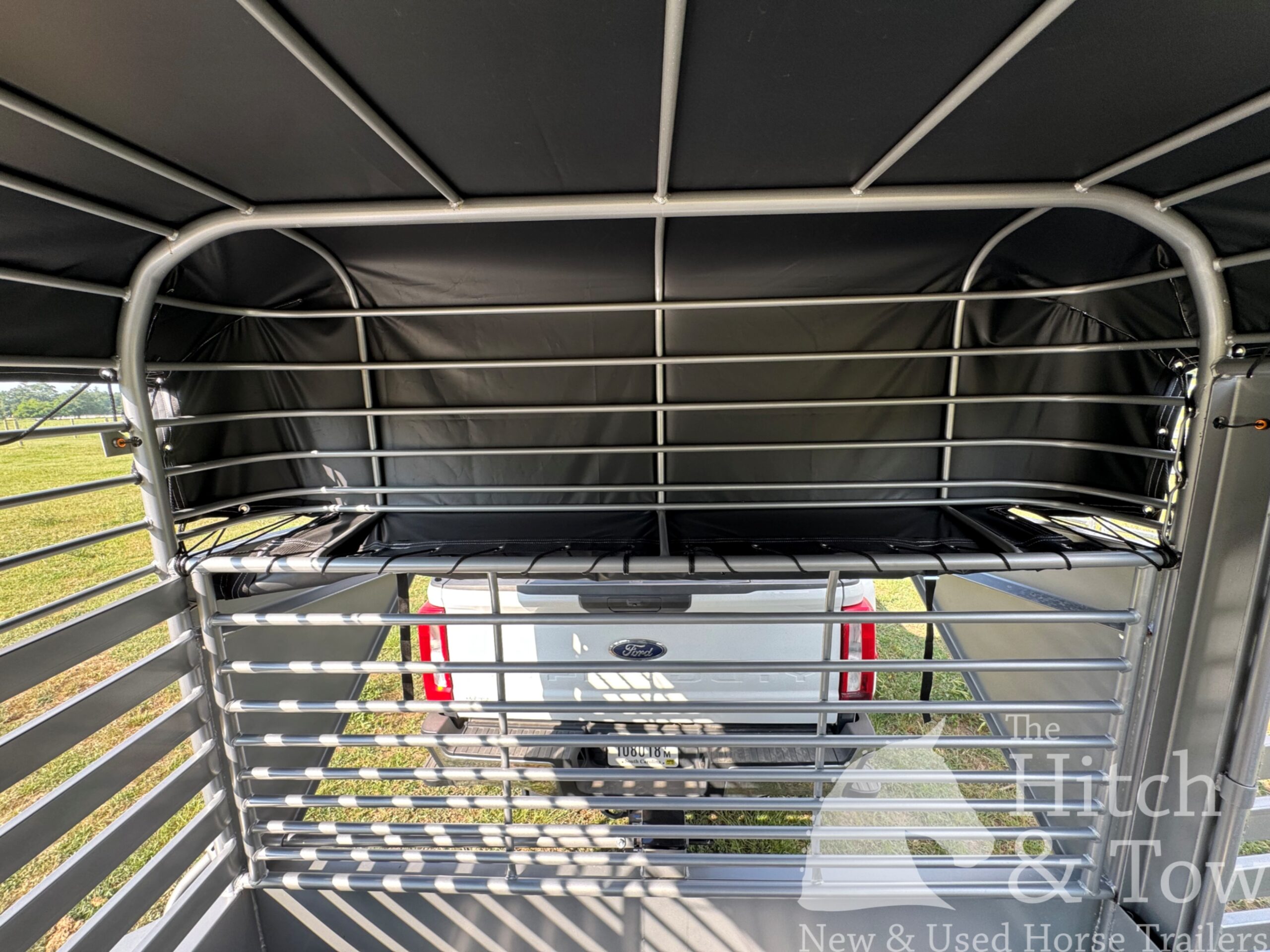 2026 20′ LIVESTOCK STOLL TRAILER W/ TUBE SIDES AND BLACK CANVAS TOP $17,580