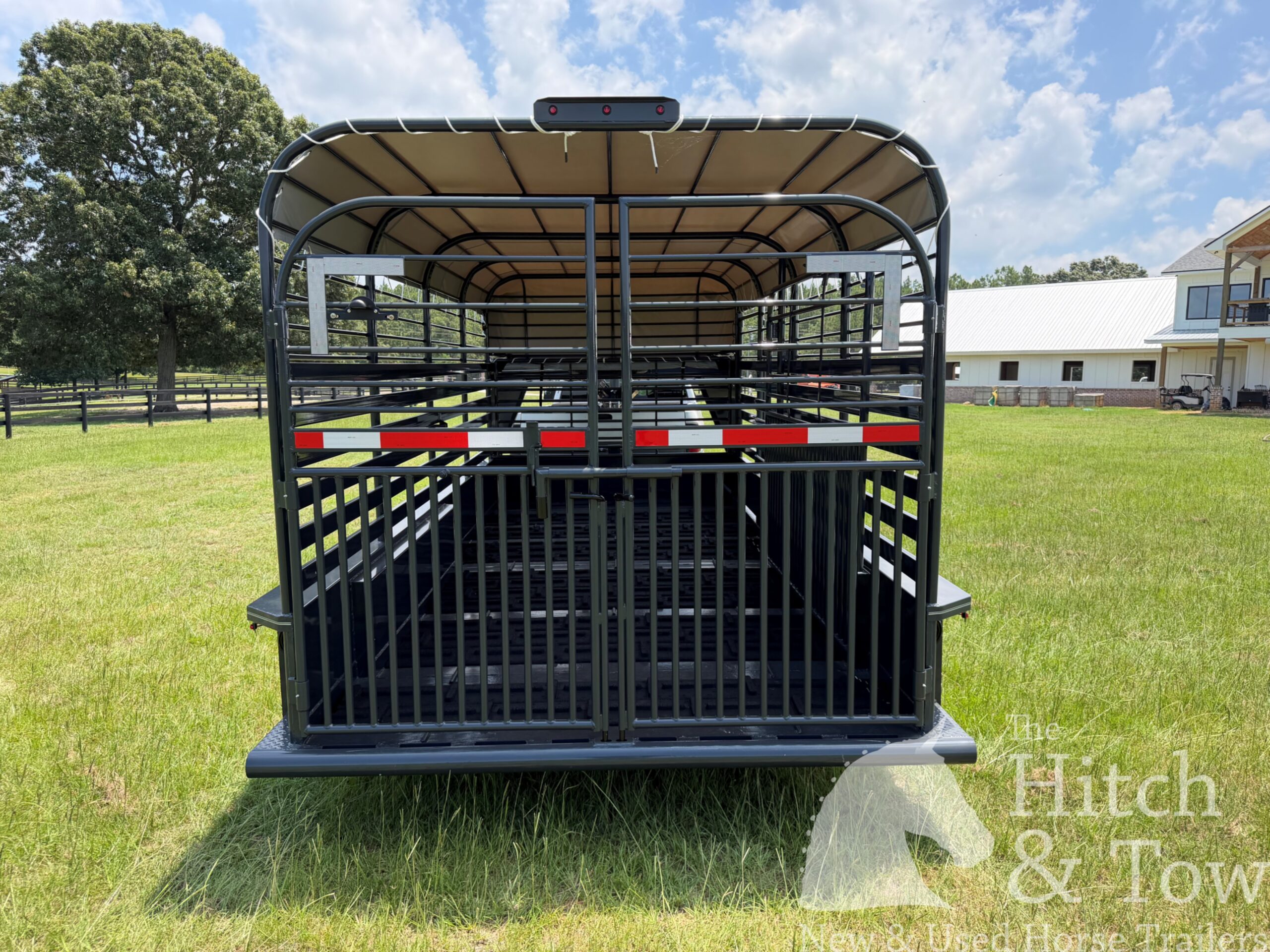 2026 16′ LIVESTOCK STOLL TRAILER W/ TUBE SIDES AND GRAY CANVAS TOP $16,450