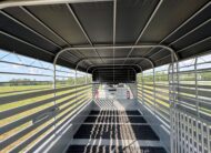2026 20′ LIVESTOCK STOLL TRAILER W/ TUBE SIDES AND BLACK CANVAS TOP $17,580