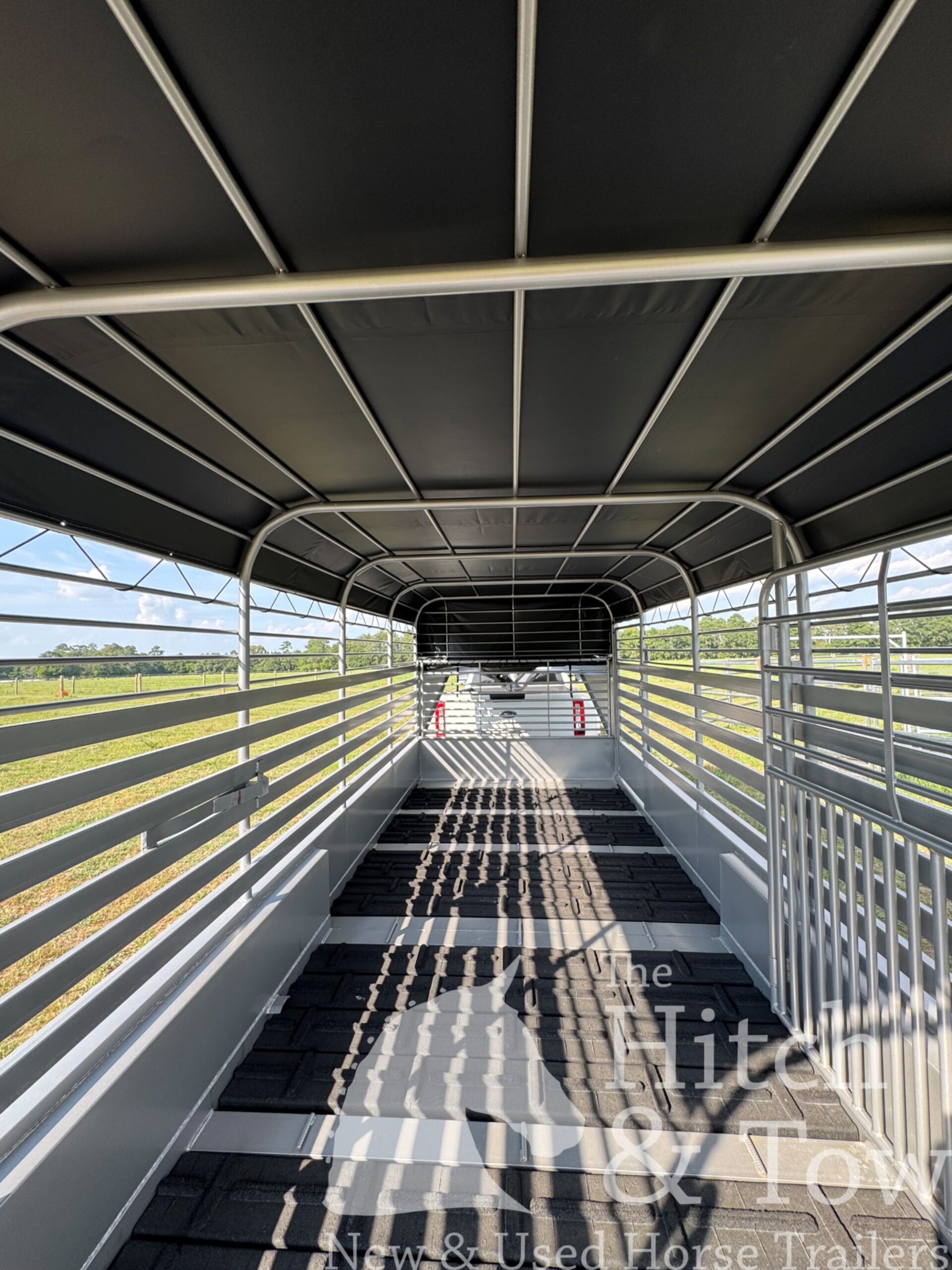 2026 20′ LIVESTOCK STOLL TRAILER W/ TUBE SIDES AND BLACK CANVAS TOP $17,580