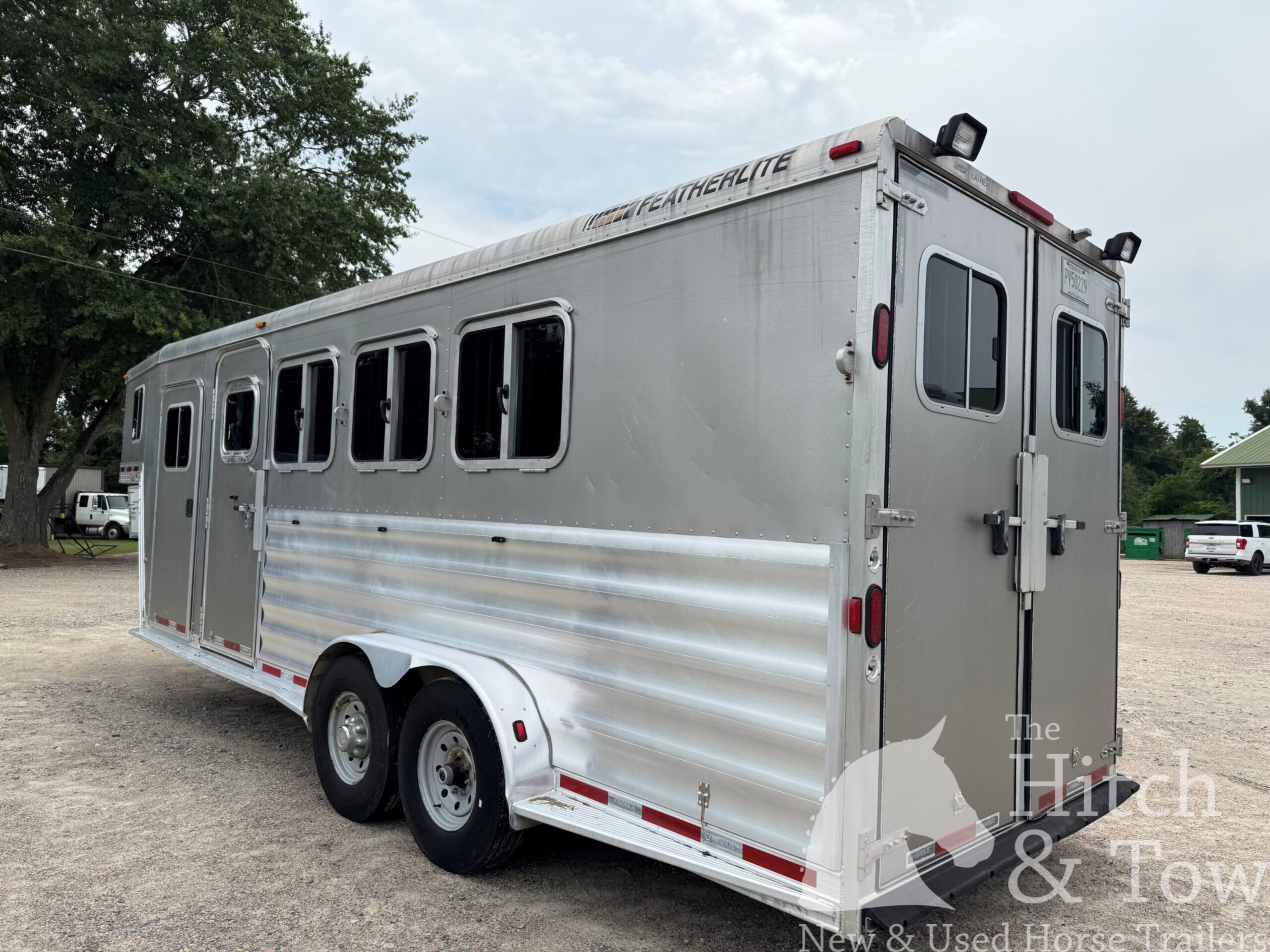 2007 FEATHERLITE 4 HORSE SLANT GOOSENECK HORSE TRAILER $17,500.